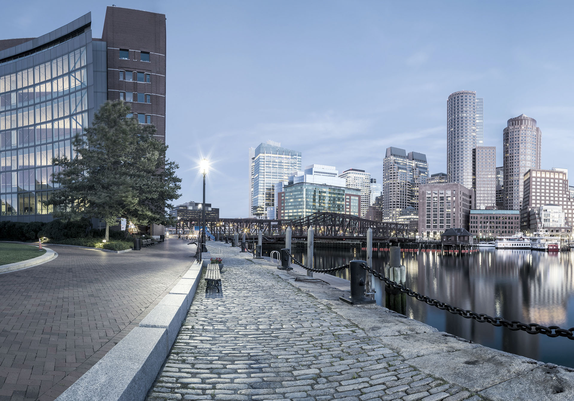 boardwalk by the river of a city