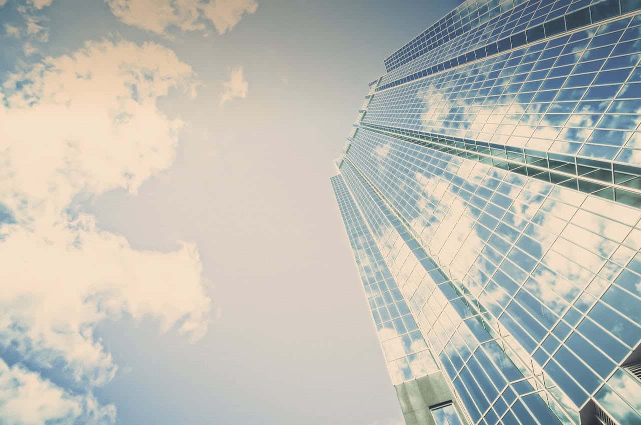 light reflecting off a large skyscraper